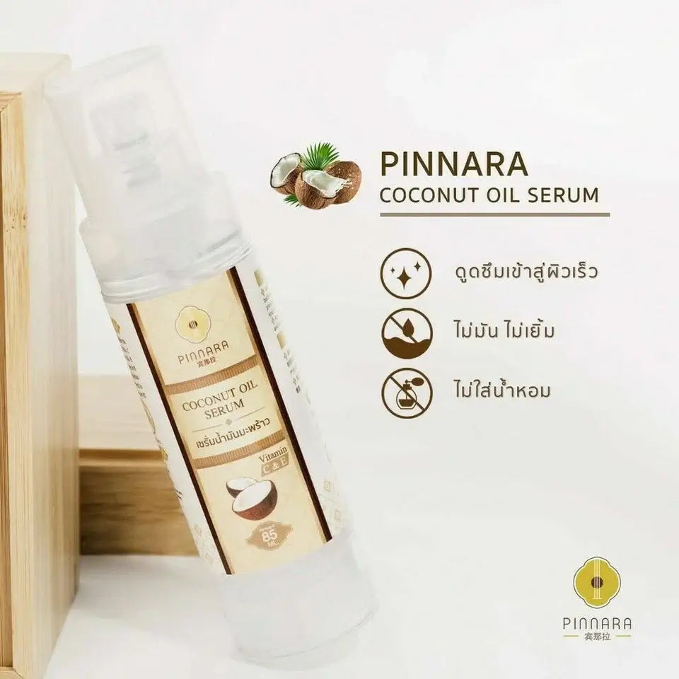 Pinnara Coconut Oil Serum natural beauty skincare concept with bottle and coconut ingredient styling