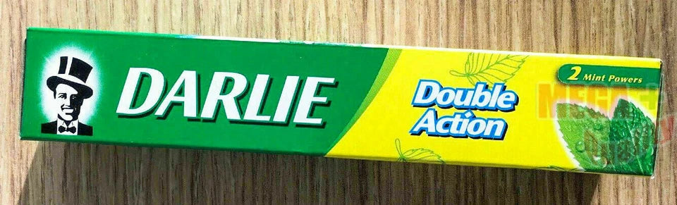 Darlie Double Action Toothpaste retail box green yellow design close up