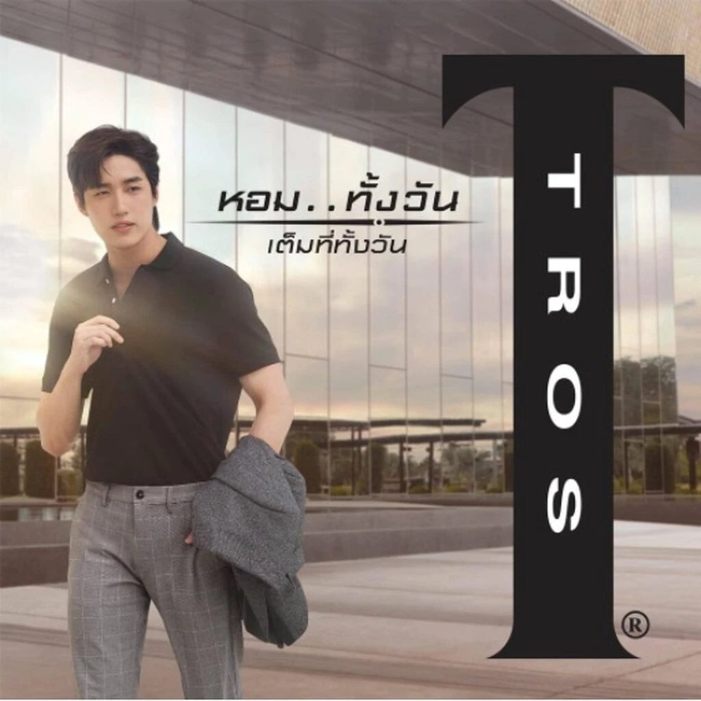 TROS Blue Code Cologne lifestyle image man using fragrance outdoors