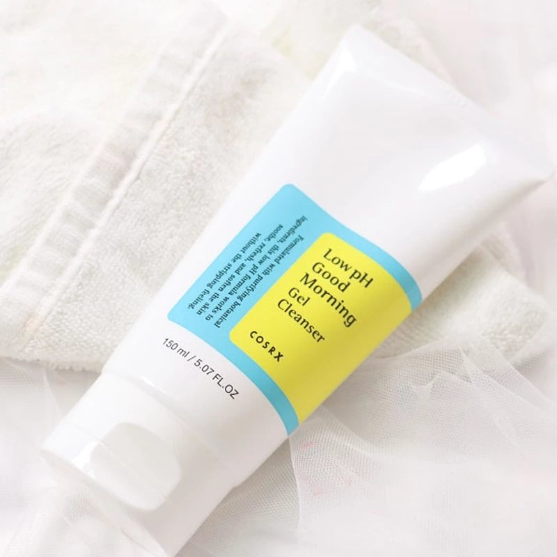 COSRX Low pH Good Morning Gel Cleanser 150ml on towel flat lay skincare photo