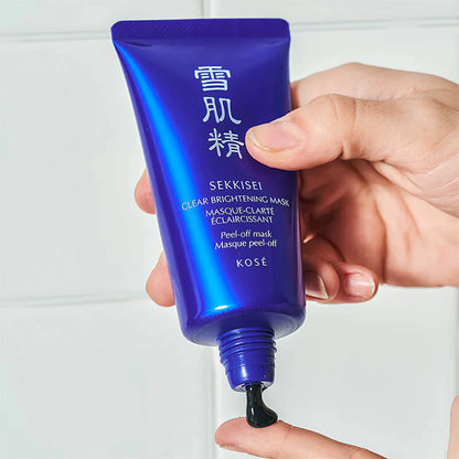 KOSE Sekkisei Peel Off Mask tube held in hand showing product size