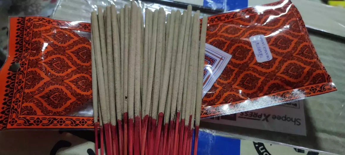 Noppamas Incense Sticks Orange Jasmine aroma sticks in packaging, perfect for creating a peaceful atmosphere.
