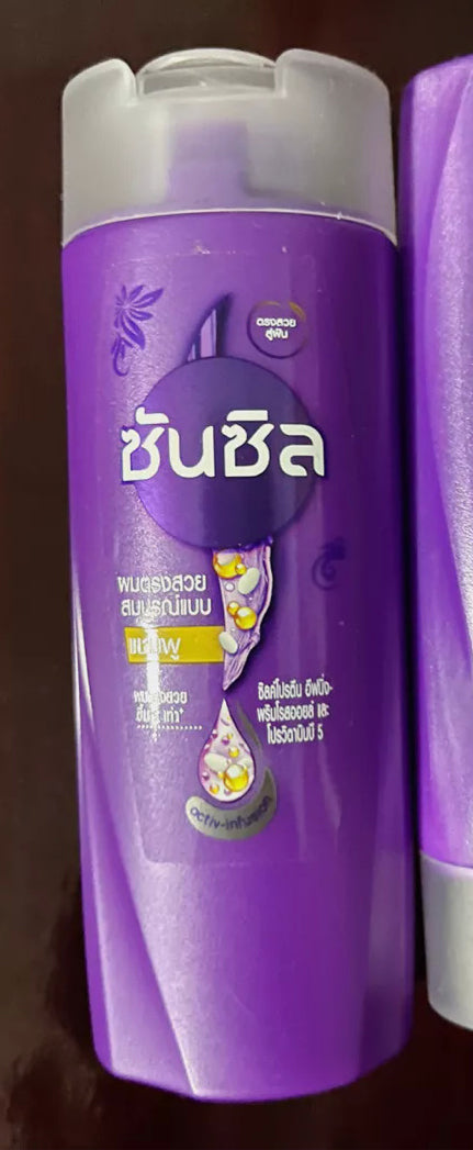 Close up of Sunsilk Perfect Straight Shampoo front label showing smooth hair formula