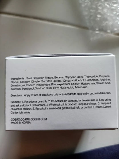 Close-up of COSRX Advanced Snail Mucin 92 All in One Cream ingredients list on label