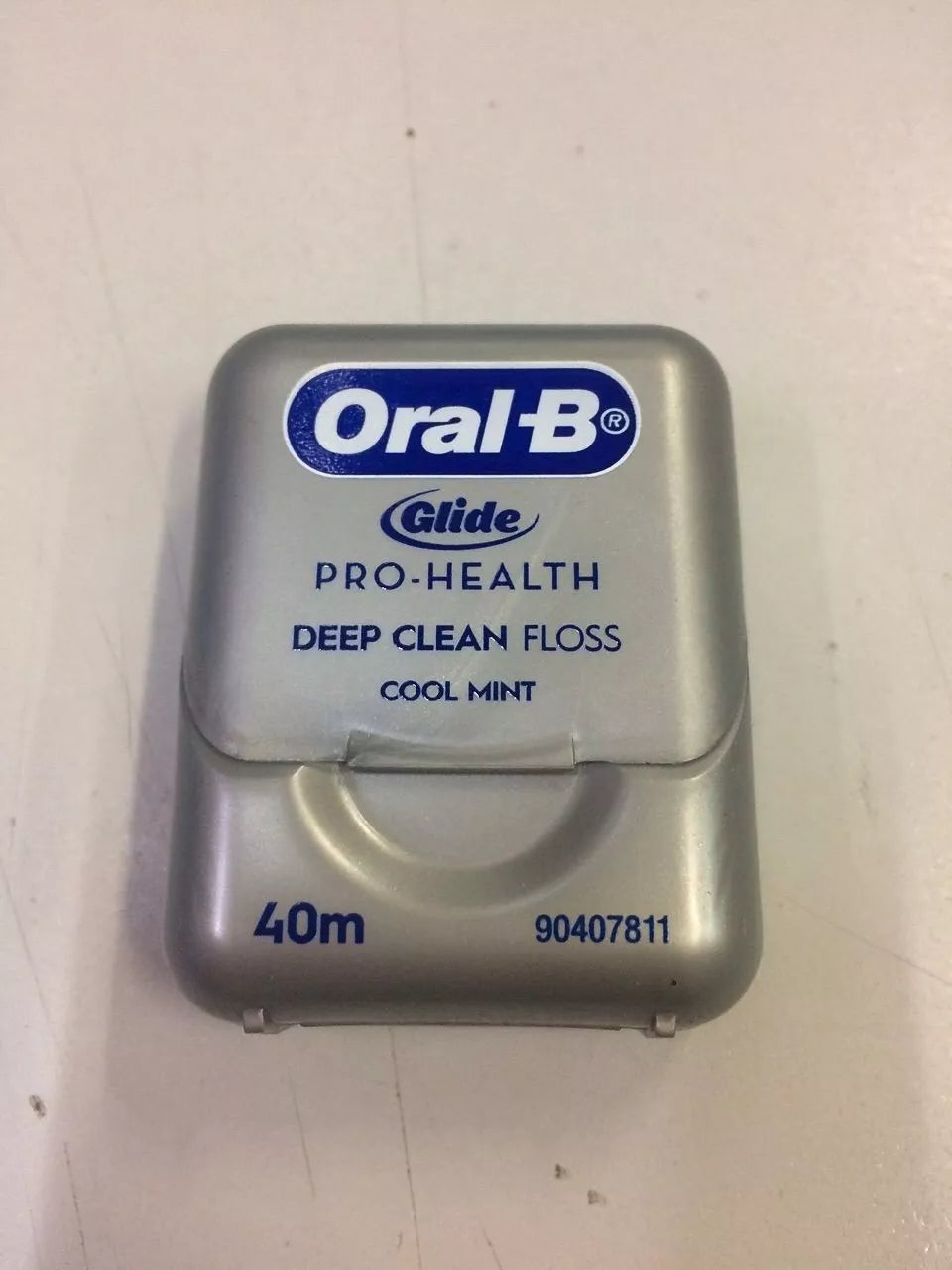 Oral-B Glide Floss deep clean cool mint product close up front view