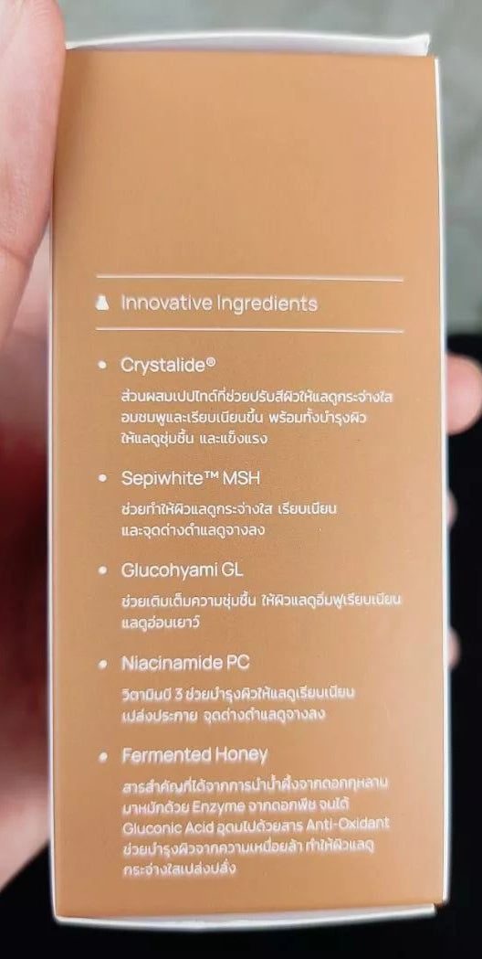 Back of INGU Brightening Crystal Serum packaging showing product description and usage details