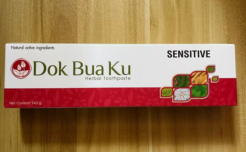 Close up of Twin Lotus Sensitive Toothpaste box showing 'Dok Bua Ku' text