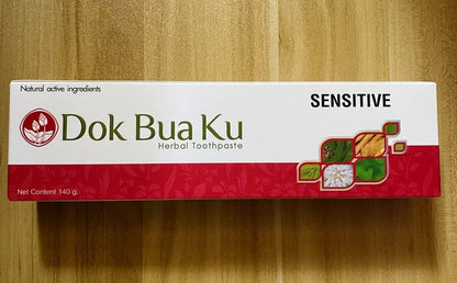 Close up of Twin Lotus Sensitive Toothpaste box showing 'Dok Bua Ku' text