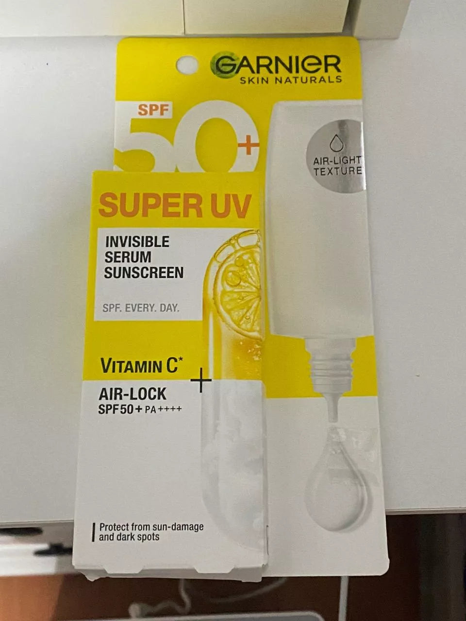Garnier Super UV Serum sunscreen SPF50 PA++++ box and bottle front packaging