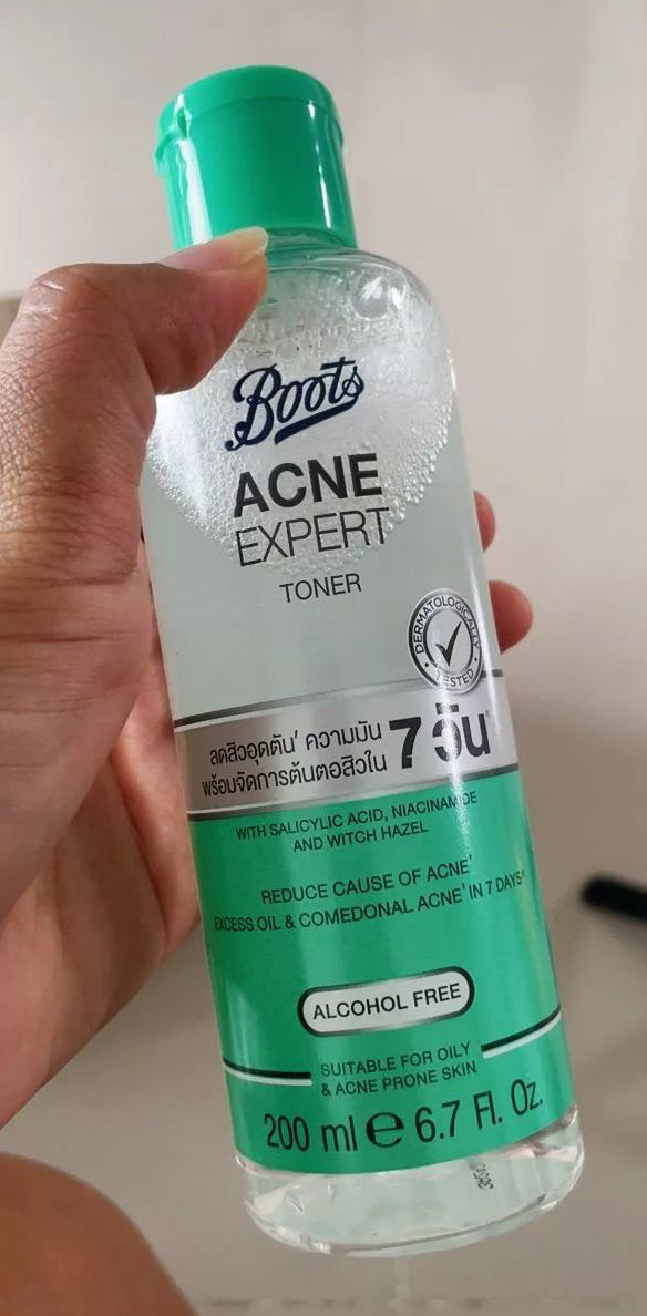 Boots Acne Expert Toner held in hand showing front label and packaging