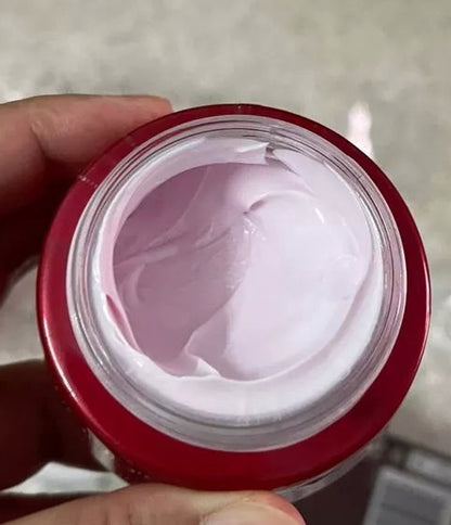 Pond 's Age Miracle Night Cream texture in jar soft pink close up