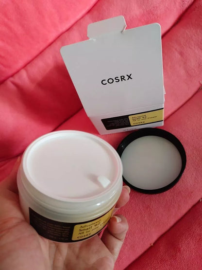 Open jar of COSRX Advanced Snail Mucin 92 All in One Cream with box and lid