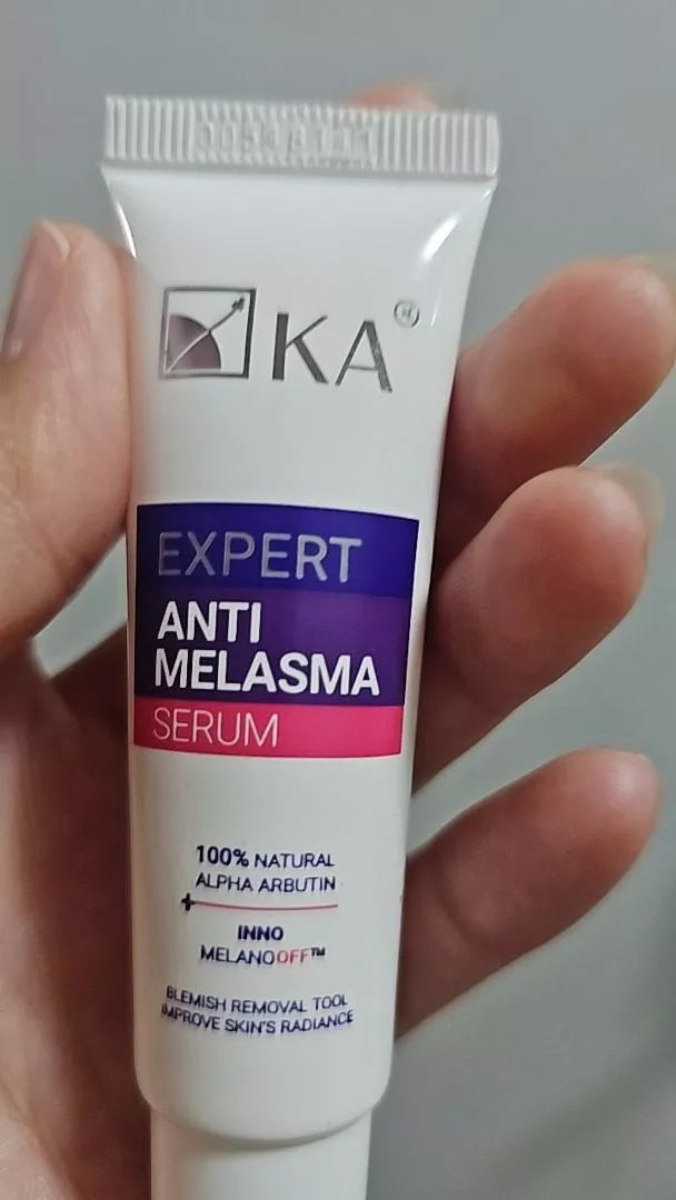 KA Expert Anti Melasma Serum tube held in hand front view