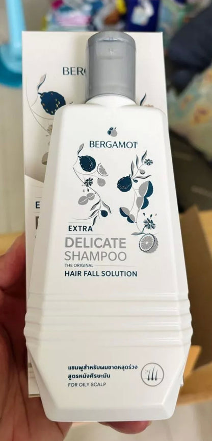 Close-up of Bergamot Delicate Shampoo front label highlighting gentle formula for hair fall control.