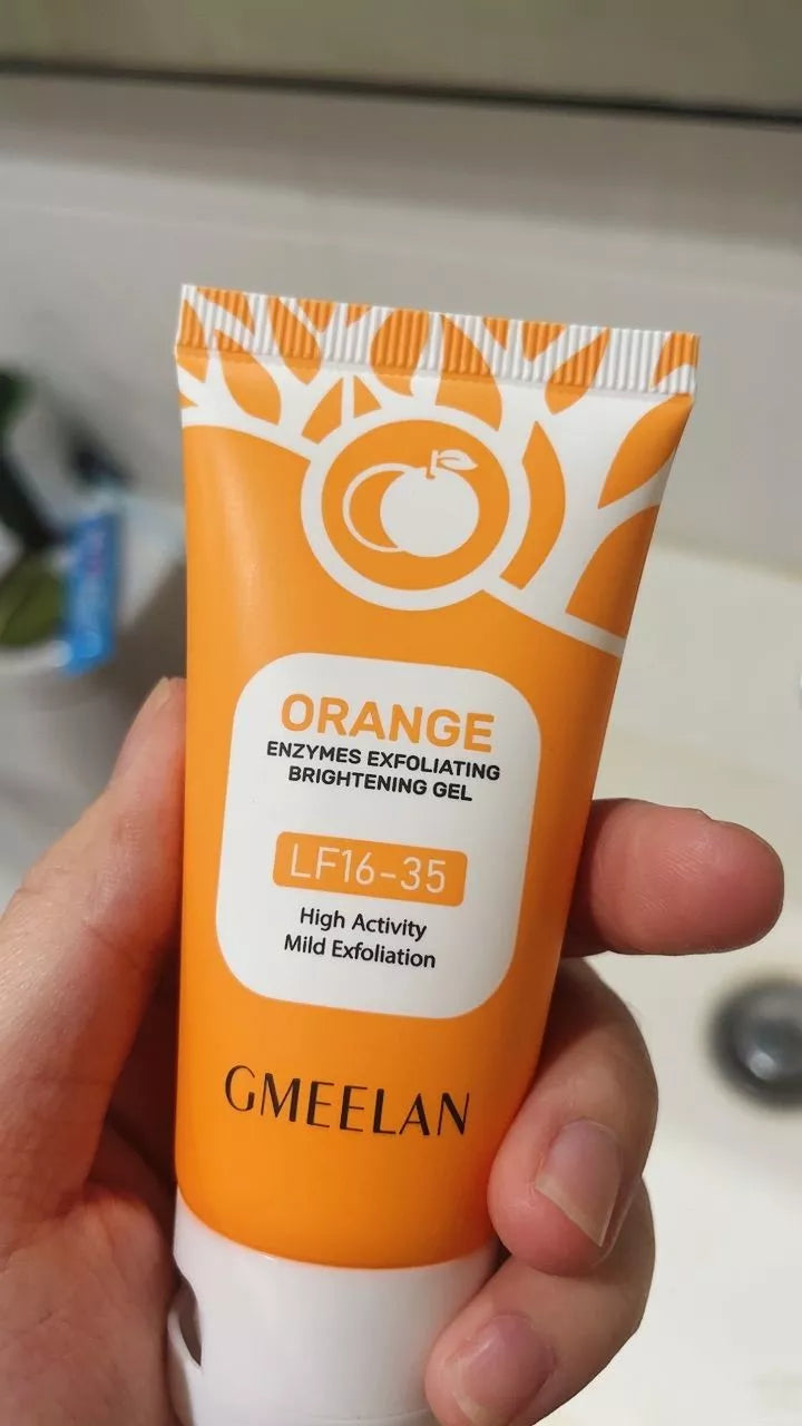 GMEELAN Orange Exfoliating Gel face body enzyme scrub tube close up