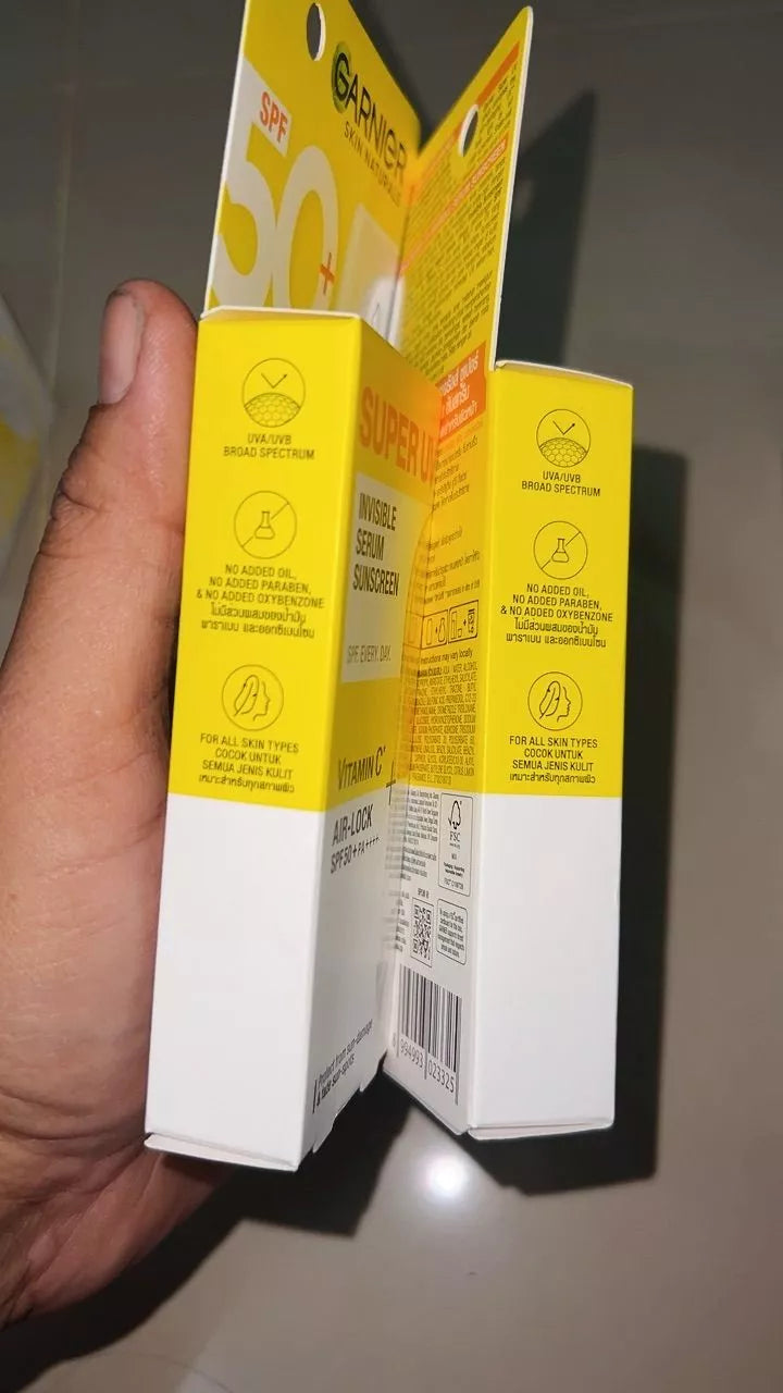 Garnier Super UV Serum SPF50 PA++++ bottle and packaging side view