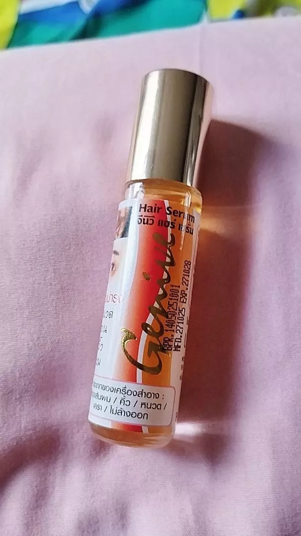 Genive Hair Growth Serum 10ml bottle aesthetic background