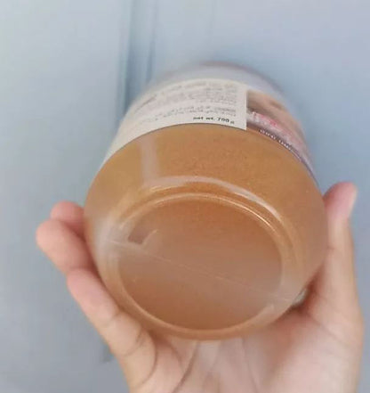 Carebeau Tamarind Salt spa scrub in hand showing texture detail