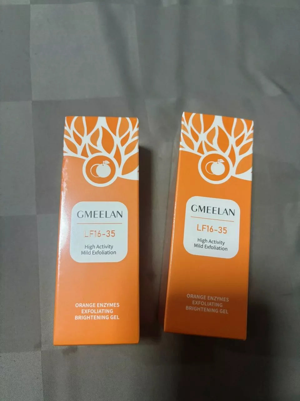 GMEELAN Orange Exfoliating Gel box and tube packaging set front view