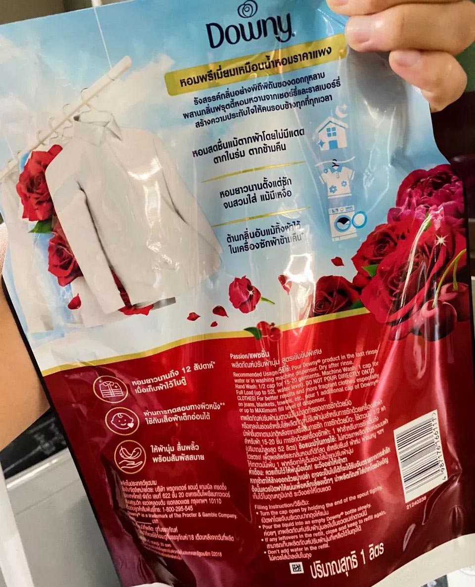 Downy Passion Fabric Softener refill pouch showing back ingredients and usage