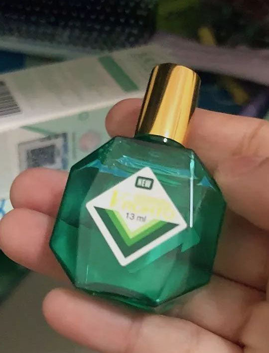 V.Rohto Eye Drops handheld bottle showing cap and label detail