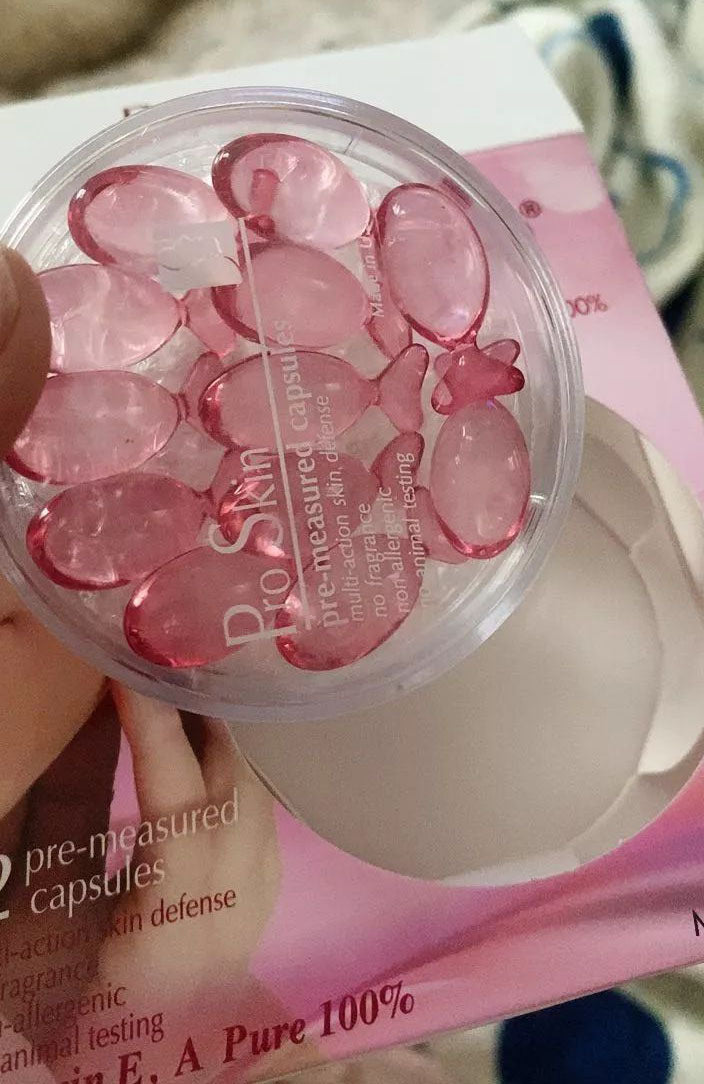 Pro Skin Maryln Vitamin pink facial capsules close up texture view