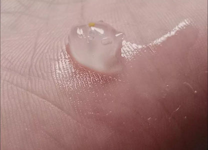 GMEELAN Orange Exfoliating Gel texture close up showing peeling gel effect