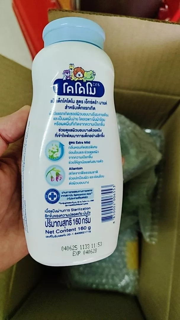 Kodomo Baby Powder Extra Mild back label displaying product details and usage instructions for newborns