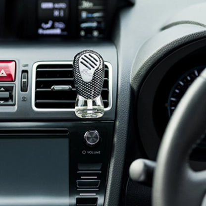 Glade Sport Cool Water car air freshener installed on vehicle air vent providing fresh cool scent