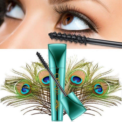 Mistine Open Up Peacock Mascara showing peacock inspired lash spread effect on eyes