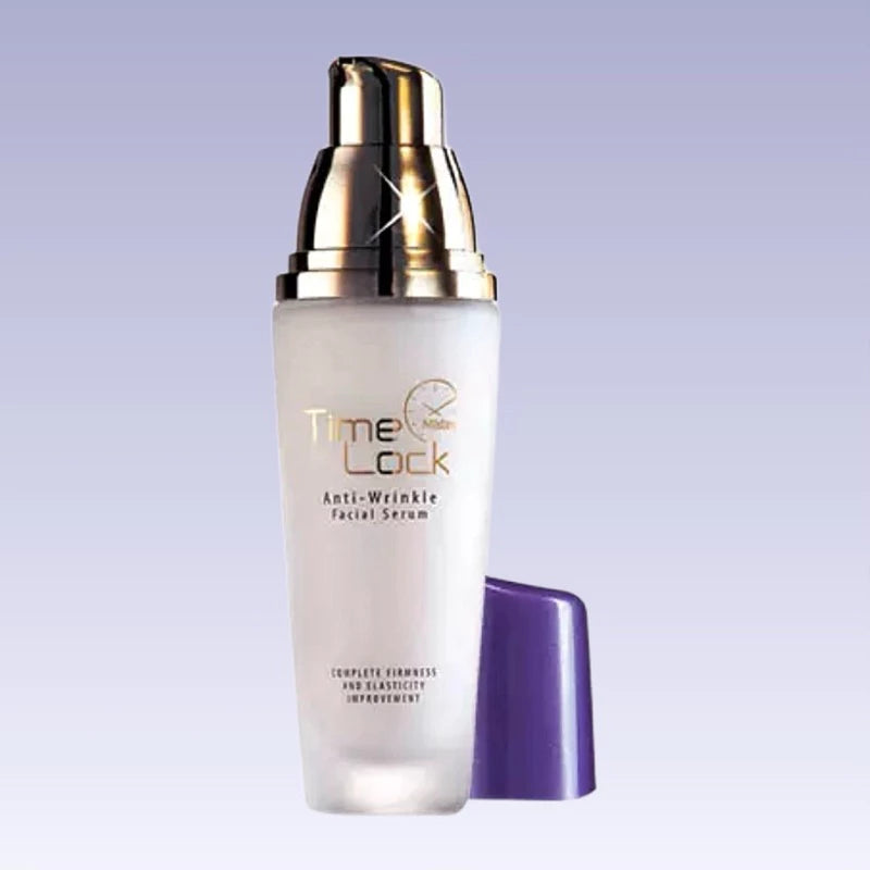 Mistine Time Lock Serum standing upright with purple cap on gradient background