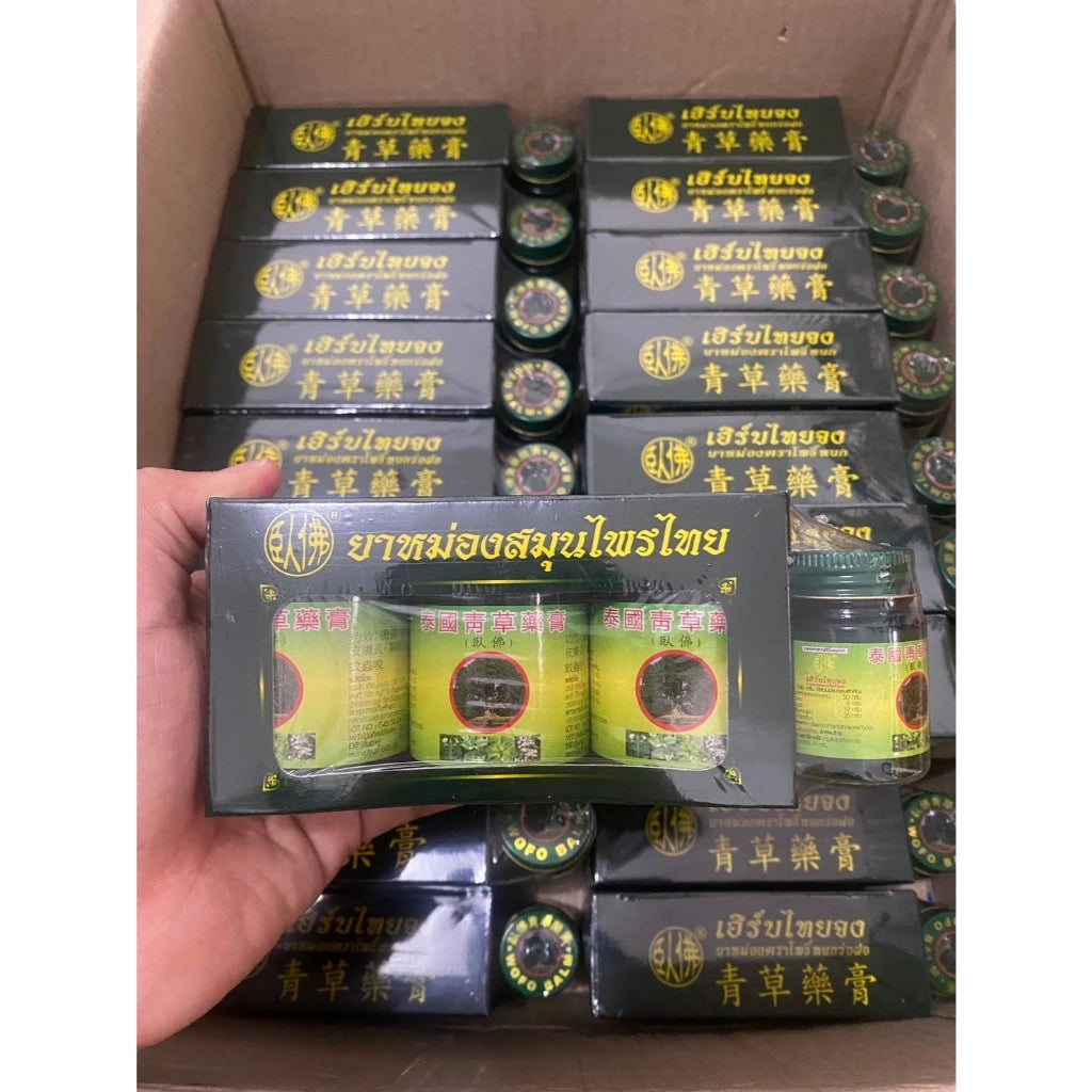 Multiple boxes of Phoyok balm with gold-on-black packaging