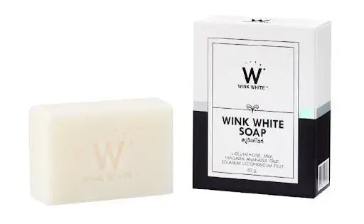 wink white soap bar next to packaging box for face and body skin care